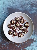 Chocolate bites with almonds and sugar sprinkles