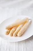 A plate of cooked white asparagus