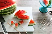 Chopped watermelon on a chopping board