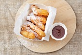 Churros with chocolate for dipping