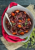 Beef stew with carrots and cherries