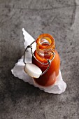 Homemade ketchup in a flip-top bottle