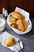 Pirozhki filled with meat and cabbage