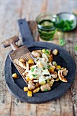 Raclette potato hash with pork and caraway