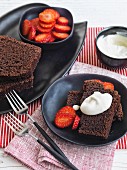 Spanish chocolate cake with strawberries and cream