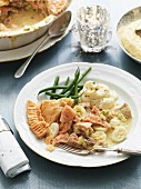 Salmon pie with bacon, quail's eggs, leek, green beans and mashed potatoes (England)