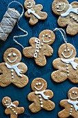 Gingerbread men with icing sugar as Christmas tree decorations