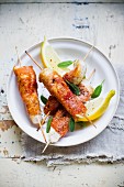 Chicken skewers with Parma ham and sage