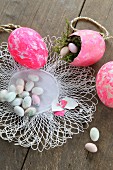 Easter eggs and sugar eggs on lace doily
