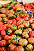 Costoluto tomatoes on a market stand