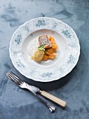 Whitefish fillet with sautéed melon and onion