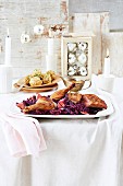 Duck on fig-red cabbage served with bread dumplings for Christmas dinner