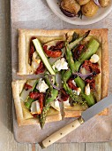 Puff pastry asparagus tart with dried tomatoes
