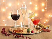 Various Christmas cocktails on a tray