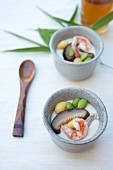 Chawanmushi (Japanese egg soup) with shiitake, enoki, edamame, ginkgo and prawns