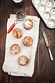 Chocolate chip muffins with icing sugar
