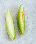Two wedges of honeydew melon