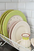 Rustic crockery in drying rack