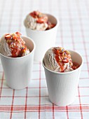 Strawberry ice cream with oat biscuits and strawberry sauce