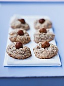 Nut macaroons topped with hazelnuts