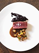 Venison fillet with chanterelle mushrooms and cassis sauce