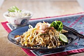 Pad Thai with prawns (noodle dish from Thailand)
