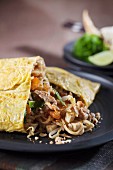 Pad Thai (noodle dish from Thailand) in an omelette
