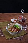 Bami Haeng Pet Yang – fried duck with noodles and source (Thailand)