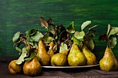 Pears with dried leaves