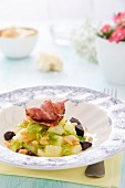 Potatoes with savoy cabbage, black pudding and bacon