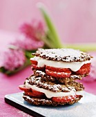 Oat biscuit sandwiches with strawberries and vanilla cream