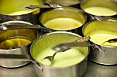 Saucepans of soup in a commercial kitchen