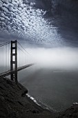 The Golden Gate Bridge half-shrouded in mist (San Francisco, USA)