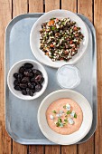 Greek mezze: taramasalata, olives and tabbouleh
