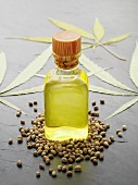 Hemp oil with seeds and leaves