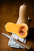 Butternut squash, whole and halved