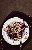 Red cabbage salad with chicken and sesame seeds