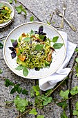 Courgette pasta with mushrooms, avocado, bean sprouts and Thai basil