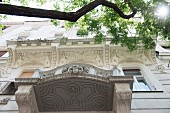The Walkó House in Budapest – white, art nouveau building with animal reliefs on the façade