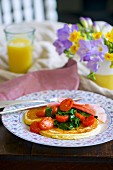 Ricotta pancake with fresh spinach, cocktail tomatoes and ham