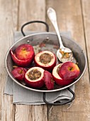 Baked apples filled with walnuts, honey and rosemary