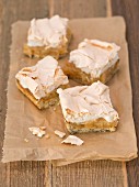 Four slices of apple cake with meringue
