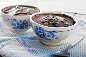 Baked chocolate pudding with chocolate sauce