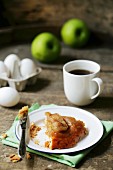 Slice of Tarte Tatin on a Plate with Fork