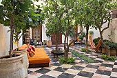 The courtyard of the El Fenn, Riad Boutique Hotel belonging to Vanessa Branson in the Medina of Marrakesh, Morocco
