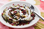 Aubergine salad with pomegranate seeds and yoghurt