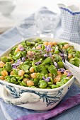 Fava bean and chickpea salad with edible flowers and sage