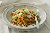 Spaghetti with broad beans, almonds and Parmesan cheese