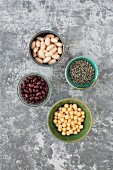 Beans, chickpeas and lentils in bowls