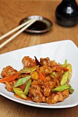 Sweet-and-sour prawns with carrots and spring onions (Asia)